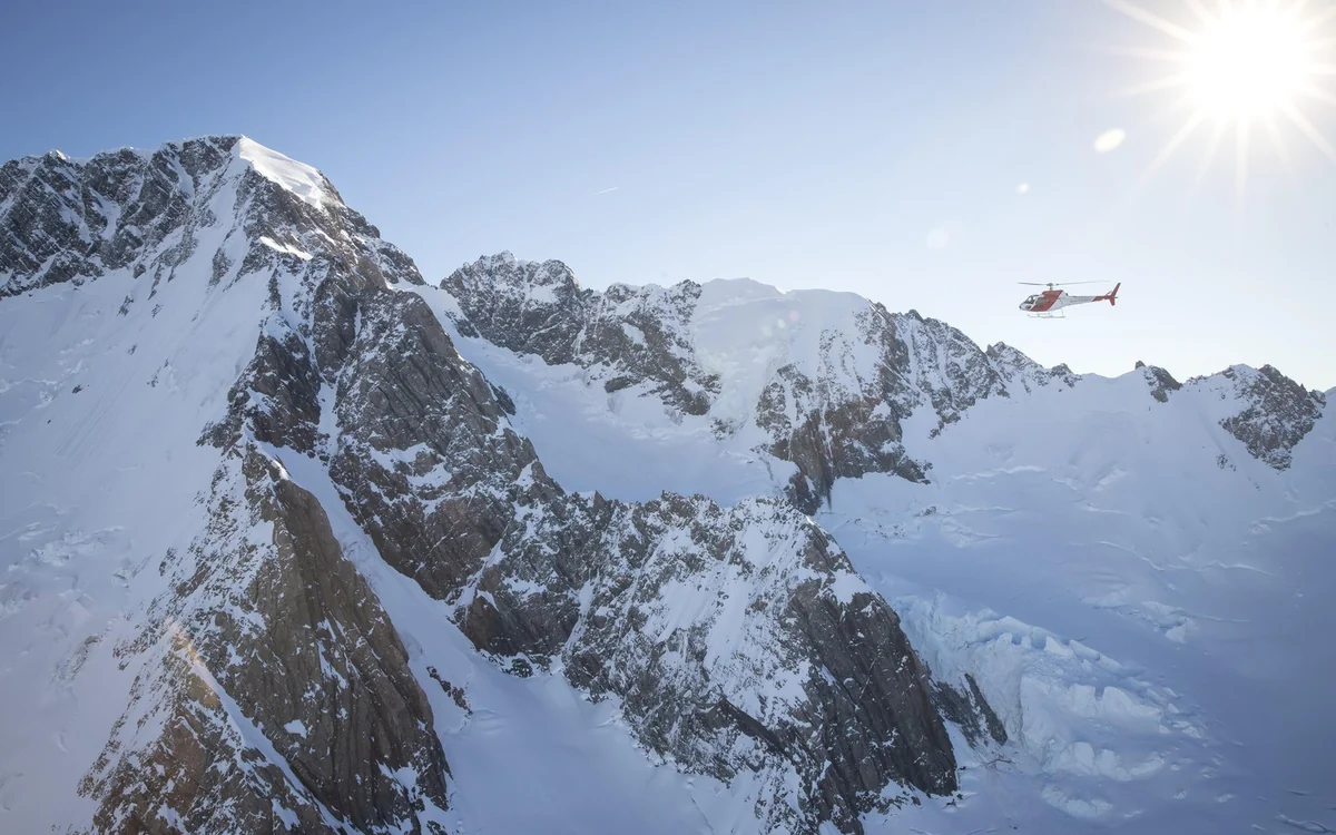 A helicopter above the Tasman Glacier in Aoraki / Mount Cook National Park